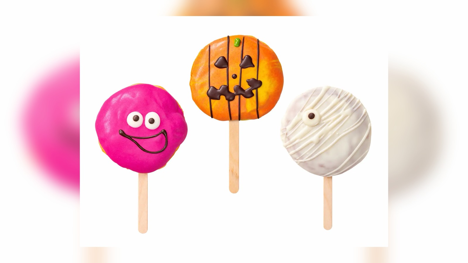 Ghost, pumpkin and mummy-style Halloween candy doughnuts